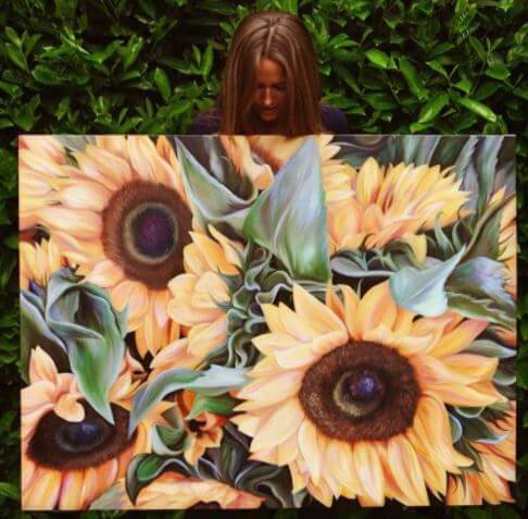 Kim Sears with her portrait.